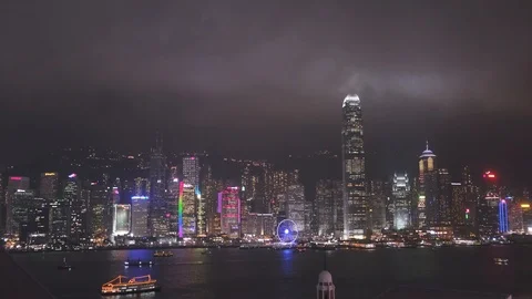 View of the light show on a busy night featuring the skyline of Hong Kong. Stock Footage 118797896