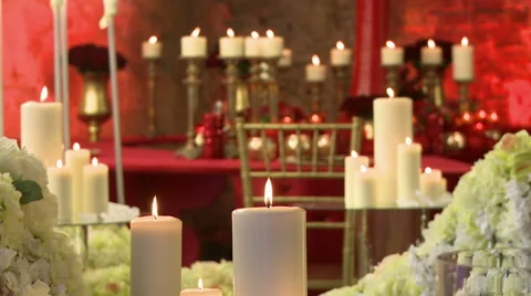 View of lighted candles on roses backdrop Stock Footage 67941933