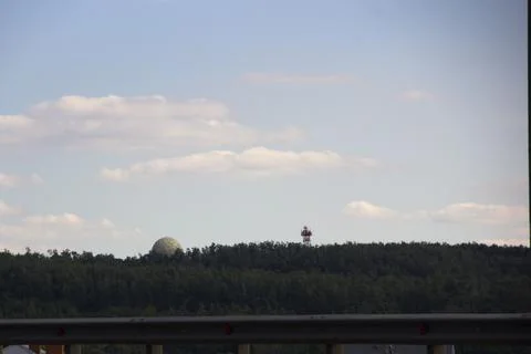 View of a lighthouse in the middle of a green forest in Russia Stock Photos