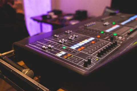 View of lighting engineer operator working on mixing console workplace duri.. Stock-Fotos