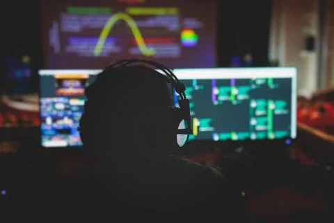 View of lighting technician operator working on mixing console workplace du.. Stock Photos