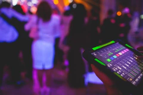 View of lighting technician with tablet, operator controlling sound and lig.. Stock-Fotos