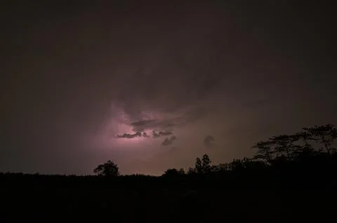 View of lightning in the sky at night Stock Photos