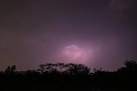 View of lightning in the sky at night Stock Photos