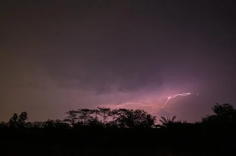 View of lightning in the sky at night Stock Photos