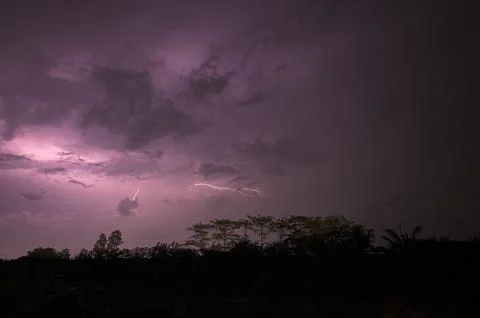 View of lightning in the sky at night Stock Photos