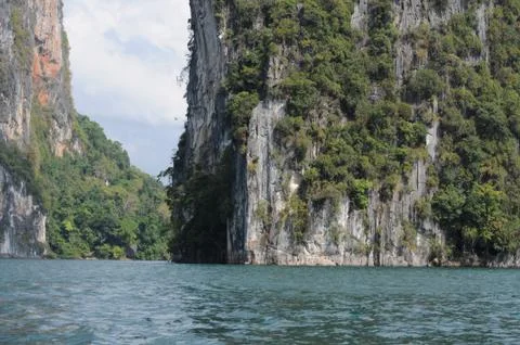 View of limestone cliffs from the water, khao sok national park, Thailand Stock Photos