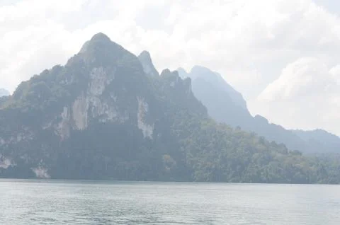View of limestone cliffs from the water, khao sok national park, Thailand Stock Photos