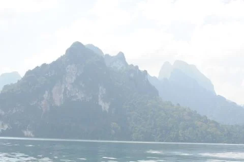 View of limestone cliffs from the water, khao sok national park, Thailand Stock Photos