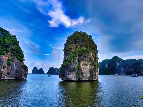 View of limestone islands in a bay during daytime Stock Photos