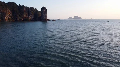View on limestone rocks and Adaman sea in Ao Nang sunset Stock Footage 129036520