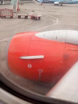 A view of Lion air's wing during its preparation to take off Stock Photos