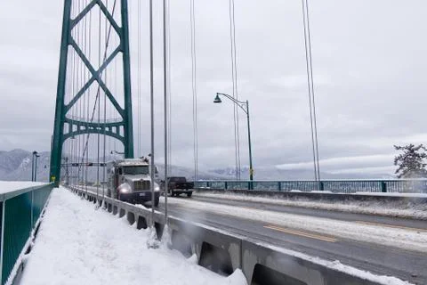 A View of Lions Gate Bridge covered in snow. Snow storm in Vancouver. Stock Photos