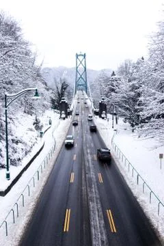 A View of Lions Gate Bridge covered in snow. Stock Photos