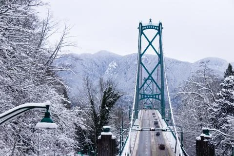 A View of Lions Gate Bridge covered in snow. Stock Photos