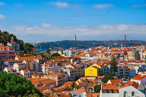 View of Lisbon from Miradouro dos Barros viewpoint with clouds. Lisbon, Portugal Stock Photos