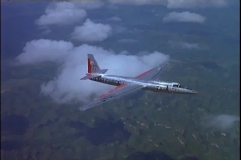 View of Lockheed U-2 No. 66715 aircraft in flight to right above clouds - 1960 Stock Footage 101167167