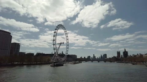 The view of the London Eye, Thames river and Victoria embankment Stock Footage 153128734