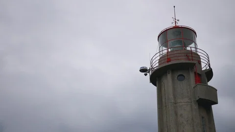 View of the lonely lighthouse in cloudy weather Stock Footage 101980404