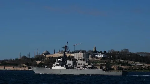 View of the long cargo ship and historical mosque on the sea. Stock Footage 148424497