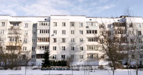 View of a long multi-storey five-storey building in winter Stock Footage 238776640