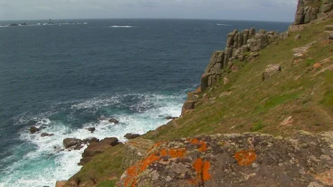 View of Longships Lighthouse in the distance in Cornwall, England Stock Footage 101490540