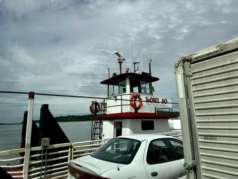 The view of the Loni Jo ferry on Ohio River from the Cave in Rock Car Ferry.. Stock Photos