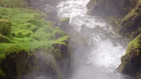 View looking down to bottom of fairy tale waterfall Video stock 221669002