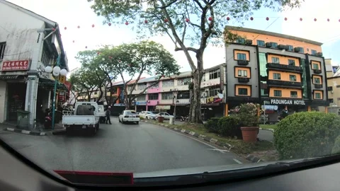 View Looking Forwards From Inside A Car Driving in Kuching City Stock Footage 107315284