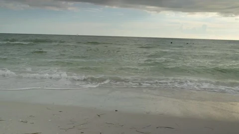 View looking at the Gulf of Mexico at Sunset Beach in Treasure Island Florida ov Stock Footage 283684854