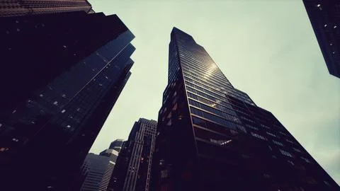 View looking up at high rise buildings Ilustración de archivo