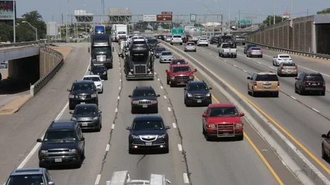 View looking north I-35 downtown Austin Texas traffic surge rush hour drive-time Stock Footage 102413788
