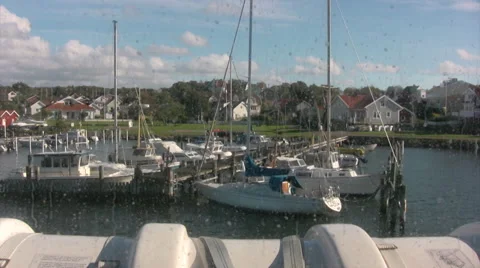 View looking out of ferry window with boats in harbor near Saltholmen 库存影片 55820036
