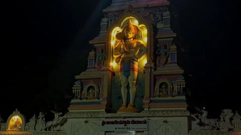 View of Lord Hanuman statue in a sacred temple setting Stock Footage 335873409