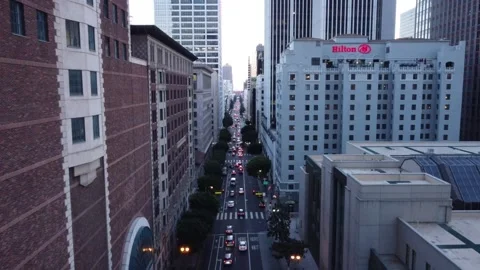View of Los Angeles Traffic Between Buildings Stock Footage 274170756
