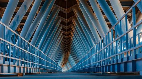 View of the lower part of a metallic construction bridge, where you can see.. Stock Photos