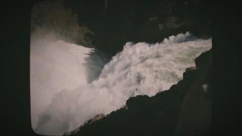 A view of Lower Yellowstone Falls and a rainbow in Yellowstone National Park. Stock Footage 136731188