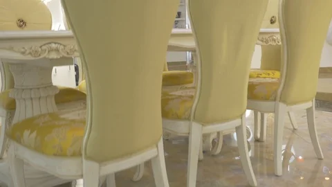 View of luxurious dining table and home appliance in the room tilt up Stock Footage 97571290