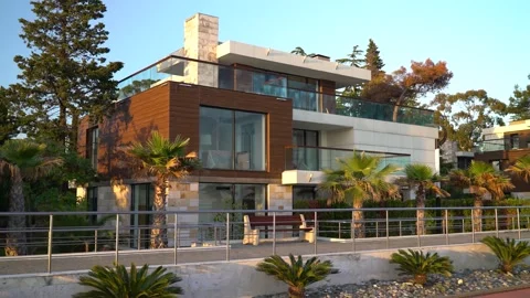 View of the luxury villa at sunset Stock Footage 131189333