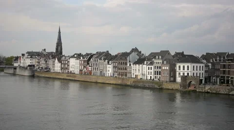 View of Maastricht from the river on a cloudy day, Netherlands Stock Footage 49610120