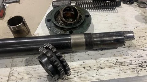 View of machine industry items such as gears and shafts Stock Photos