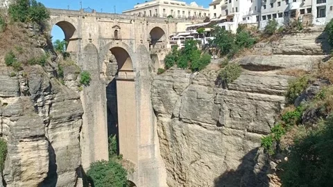 View of the majestic stone bridge over the Gudalevin River, Ronda Stock Footage 344577797