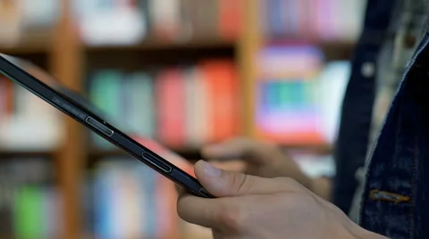 View of male hands browsing internet on tablet Stock-Footage 67542890