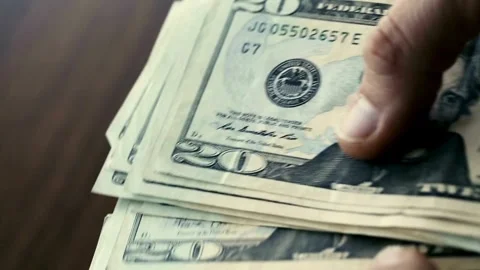 View of male hands counting stack of dollars bills. dollar cash money exchange, Stock-Footage 336264204