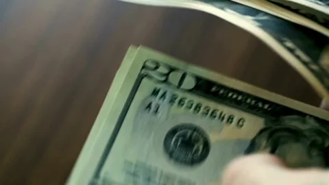 View of male hands counting stack of dollars bills. dollar cash money exchange, Stock-Footage 336264470