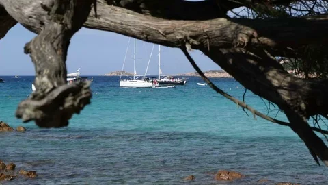 A view of a man diving from a sailboat in the Mediterranean Sea Stock Footage 108941033