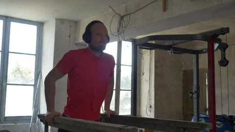 View of man doing dips in his home gym. workout at home fitness garage gym. Stock Footage 142138365