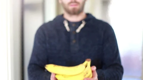 View of man hands holding bananas Stock Footage 59541760
