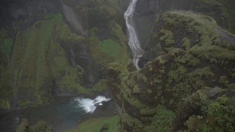 View of man with raised hands up feeling freedom while standing at Stock Footage 94118166
