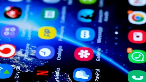 View of man tapping on a smartphone paypal app icon,digital safe wallet payment Stock Footage 126737457